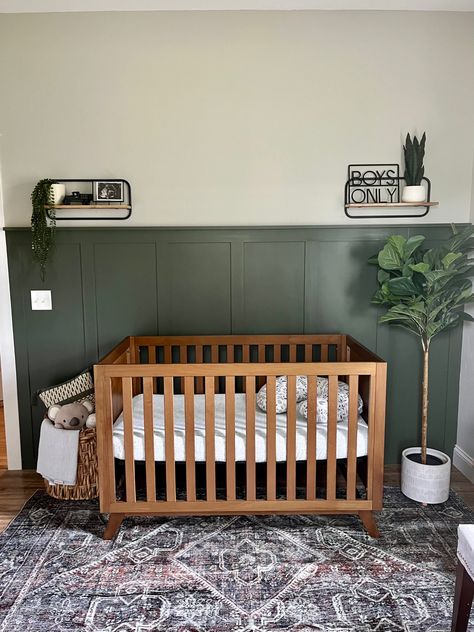 Half Green Wall Nursery, Half Accent Wall Nursery, Dark Green Board And Batten Wall, Board And Batten Wall Nursery Boy, Boy Nursery Green Accent Wall, Accent Wall Nursery Boy, Green Shiplap Wall Nursery, Nursery Green Accent Wall Black Crib, Board And Batten Wall Nursery