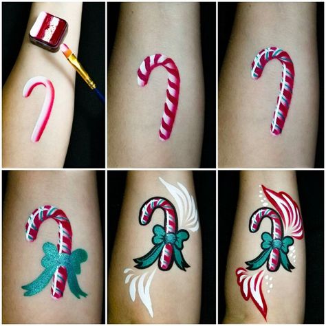 Terrific candy cane step-by-step by our new artist Rep Shelly Polsoni! This is a homemade split cake using our Paradise Red and Wolfe White. DFX Metallic Green for the stripes and bow, and a strong Wolfe White shine really make this look really pop. Face Painting Christmas Easy, Christmas Body Painting, Xmas Face Painting Kids, Rainbow Face Paint, Homemade Face Paints, Fair Face, Christmas Face Painting, Split Cake, Face Painting Tutorials