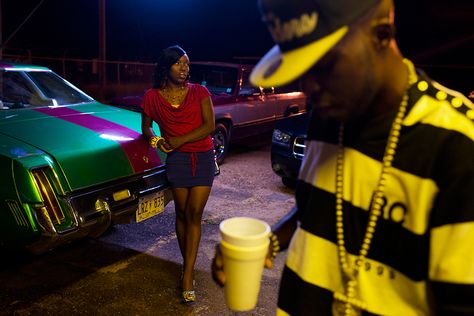 17 Rapper Nino "X Man" Issac walks into club Blitz while his wife rests on his car for a birthday party in Greenwood, Mississippi on July 29, 2012. Later that evening a fight broke out in the club and shots were fired in the parking lot. (Ian C. Bates) # Photojournalists under 25 - Photos - The Big Picture - Boston.com Food Delivery Logo, Greenwood Mississippi, Parking Lot Party, Birthday Songs Video, Birthday Songs, School Photography, X Man, Parking Lot, Photojournalism