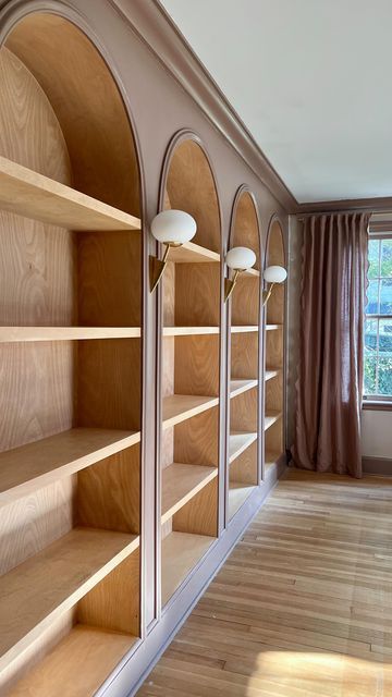 Bookcase Crown Molding, Built In Bookshelves With Sconces, How To Build A Bookshelf Wall, Built In Floor To Ceiling Bookshelves, Wooden Built In Bookshelves, Birch Bookshelf, Build In Bookshelves Living Room, Arched Bookshelf Built Ins, Small Library Room Ideas Bookshelves