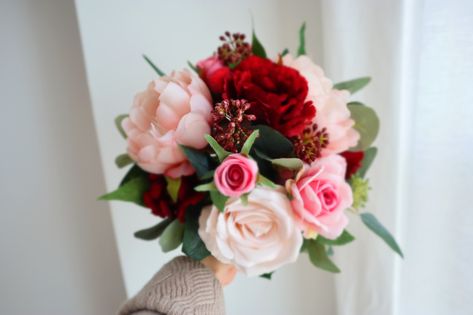 This pretty bouquet is accented with gorgeous silk flowers. It is perfect for an outdoor or woodland-themed wedding. It could be used on the weddings,and also could be used as home decoration,even as a gift for the bridesmaid. Very useful.Meaning of different kinds of bridal bouquet.Rose is the best representative of love,rose bouquet has become the first choice of many couples wedding flowers,but the different colors of rose on behalf of the meaning is not the same : red roses : I love you;Pink Red White Pink Flower Bouquet, Pink And Red Prom Bouquet, Prom Bouquet With Red Dress, Red White And Pink Bouquet, Prom Bouquet Ideas Red Dress, Red Homecoming Bouquet, Prom Flowers For Red Dress, Prom Bouquets For Red Dress, Flowers For Red Dress