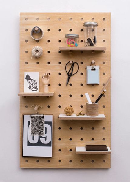 Cute idea to recreate with reclaimed wood and all those dowel offcuts we received from the filter company. #getorganized #reclaimed #wood Hang Pegboard, Wooden Pegboard, Pegboard Ideas, Pegboard Storage, Peg Boards, Plywood Projects, Small Shelves, Design Milk, Peg Board