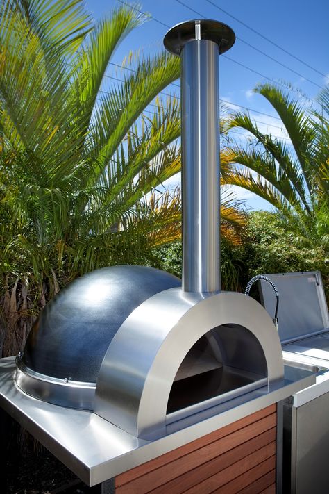 As Seen on TV ‘Master Chef’ and used by Celebrity Chefs world wide

The latest design in woodfired pizza ovens is revolutionary and is what we consider to be the perfect woodfired oven.
Its streamline external stainless steel finishing touches make this oven blend in perfectly with other items such as BBQs, fridges and sinks.
Made in Australia from premium quality refractory and insulation materials. Kitchens Australia, Woodfired Pizza Oven, Best Outdoor Pizza Oven, Pizza Oven Outdoor Kitchen, Luxury Outdoor Kitchen, Portable Pizza Oven, Diy Pizza Oven, Oven Design, Four A Pizza