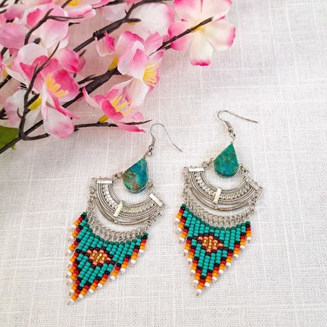 These South American artisan-made earrings are crafted from Peruvian Chrysocolla gemstone featuring a distinctive teardrop shape. Measuring 2.50 inches in length and 1.00 inche in width, they make for a stunning addition to any jewelry collection. Handmade Chandelier, Unique Handmade Earrings, Dangle Earrings Boho, Pure Love, Great Gifts For Women, Earring Crafts, Beaded Dangle Earrings, Silver Pieces, Beaded Dangles