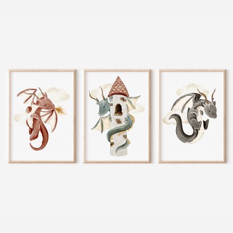 "This set of 3 dragon nursery prints are perfect for any dragon theme room. These watercolor prints feature a red fire breathing dragon flying in the clouds, a dragon wrapped around a castle tower, and an adorable black dragon flying in the clouds. Display this printable dragon wall art in a dragon boy room, dragon playroom, or a dragon girl room. Three very cute dragon posters that will bring you and your little one happiness, magical storytelling, and bright imagination. Bring a dragon fantasy Medieval Themed Nursery, Nursery Fantasy Theme, Dragon Wall Decor, Knights And Dragons Nursery Baby Boy, Dragon Nursery Girl, Dnd Nursery Theme, Fantasy Themed Nursery, Dragon Bedroom Ideas, Dragon Baby Nursery