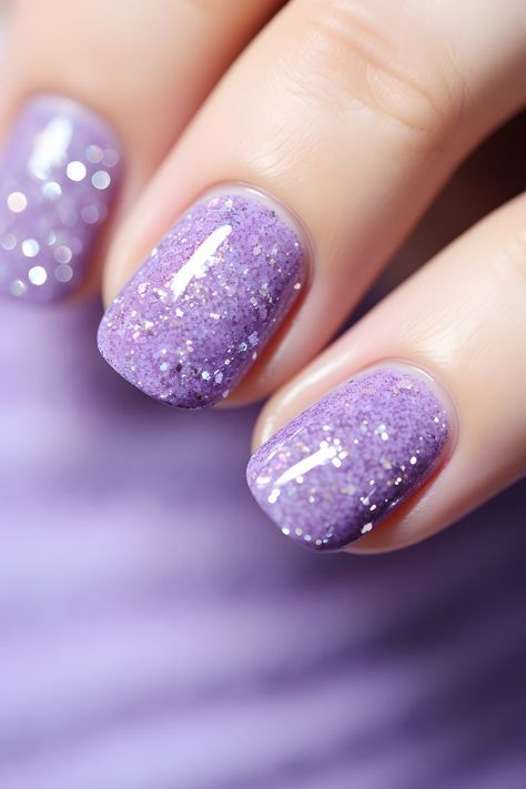 lilac glitter nails, nail art, nail design, manicure, sparkly nails, glittery nails, nail inspo, beauty, nail ideas, nail trends, nail goals, holiday nails, festive nails, winter nail inspo, glamorous nails, shimmering nails, stylish nails, trendy nails, nail fashion, nail inspiration, nail colors, nail shades, nail vibes, nail aesthetics, nail sparkle, nail magic, new years eve nails glitter, new years 2024 Festive Nails Winter, Lilac Glitter Nails, Lilac Nails With Glitter, New Years Eve Nails Glitter, Shimmering Nails, Nail Sparkle, Glitter Nail Ideas, Nail Aesthetics, Lilac Glitter