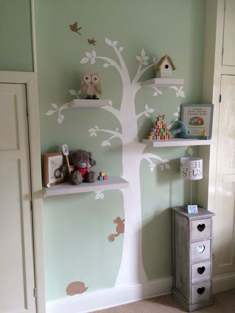 Tree Bookcase Nursery, Woodland Painting Nurseries, Nursery Tree Bookshelf, Tree Bookshelf Nursery, Woodland Theme Playroom, Tree Nursery Theme, Neutral Green Nursery, Forest Theme Bedroom, Woodland Theme Bedroom