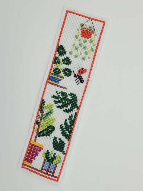 A bookmark cross stitch pattern featuring popular house plants. Designed to be made into a bookmark but could also be framed .  This is a digital item. The PDF file of the pattern will be available for instant download once payment is confirmed. No fabric, embroidery thread or materials are included. The pdf includes a black and white chart and colour charts with a key for the DMC threads used. A link to help download the pdf : https://help.etsy.com/hc/en-gb/articles/115013328108?segment=shoppin Plant Cross Stitch Bookmark, Cross Stitch Bookmark Patterns Free Charts, Plants Cross Stitch, Plant Bookmark, Bookmark Cross Stitch Pattern, Cross Stitch Bookmark, Chart House, Stitch Bookmark, Bookmark Pattern