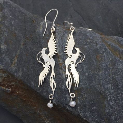 Long and elegant like a flickering flame - our Firebird stretches his wings gracefully from your lobes…with little tiny pearls beads for a touch of ice...... Phoenix Earrings, Phoenix Images, Phoenix Jewelry, Earrings With Pearls, Phoenix Bird, Swirl Earrings, Silver Jewelry Design, Bird Earrings, Bird Jewelry