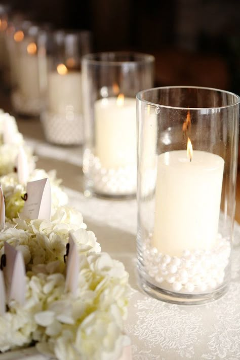 Candles with pearls Tablescape Centerpiece www.tablescapesbydesign.com https://www.facebook.com/pages/Tablescapes-By-Design/129811416695 Pearl Centerpiece, Flowers And Candles, Gladioli, Wedding Help, Online Wedding, Glass Vases, Pearl Wedding, Center Pieces, Hollywood Glamour