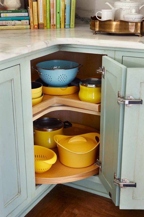 Learn more about this organization staple, plus how to use a lazy Susan to tidy your home. Diy Lazy Susan Organizer, Lazy Susan Kitchen Cabinet, Kitchen Lazy Susan, Lazy Susan Cabinet, Lazy Susan Kitchen, Diy Lazy Susan, Lazy Susan Organization, Closet Clutter, Coffee Bar Design