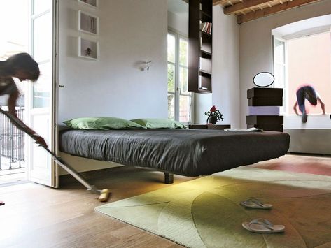 Supported by a meticulously designed single beam in the middle of it and secured to the wall by means of one of three headboard options, the Fluttua bed designed by Daniele Lago, appears to float effortlessly above the ground. Shiplap Room, Small Bathroom Plans, Suspended Bed, Steel Bed Design, Pallet Outdoor Furniture, Fold Down Beds, Owners Suite, Platform Bed Designs, Bed Design Ideas