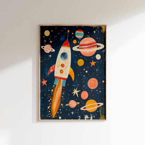 A vibrant art print showcasing a rocket launch with colorful planets in the background. Perfect for kids' rooms, this outer space-themed decor adds a fun and educational element to any nursery wall. This print is available in our Kid's Room Bundle, you can find it here: https://pspaperdesign.etsy.com/listing/1752741480/100-eclectic-boys-room-prints-bundle-fun Features: *Space Rocket Print *High-resolution digital download A4, 5x7", 16x20", 18x24", 11x14", 24x36" *Perfect for boys' room, nursery, Toddler Space Bedroom, Boys Space Bedroom, Outer Space Posters, Solar System Print, Space Themed Room, Space Rocket, Space Room, Space Wall Art, Toddler Boys Room