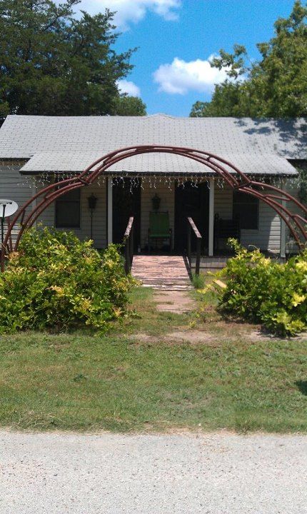 I recycled an old hay ring and made an grand arbor for my wysteria Hay Ring Arbor, Repurposed Hay Ring, Hay Ring Arch, Hay Ring Ideas, Hay Bale Decor, Diy Backyard Landscaping, Moon Garden, Garden Living, Garden Yard Ideas