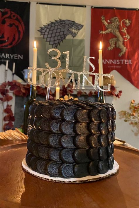 Game of Thrones Birthday Theme Party. I threw my own 31st birthday party and decided on GOT. I custom ordered this dragon scale cake and etsy ordered the cake topping that reads "31 is coming". Did a great food theme of a whole chicken roast, sour breads and cheese platter. Drank red wine and lit candles. Also had the fireplace going with GOT episodes playing in the background. Game Of Thrones Theme Party, Dragon Scale Cake, Game Of Thrones Birthday Cake, 31st Birthday Party, Game Of Thrones Halloween, Dragon Birthday Cakes, Game Of Thrones Birthday, Game Of Thrones Cake, Game Of Thrones Theme