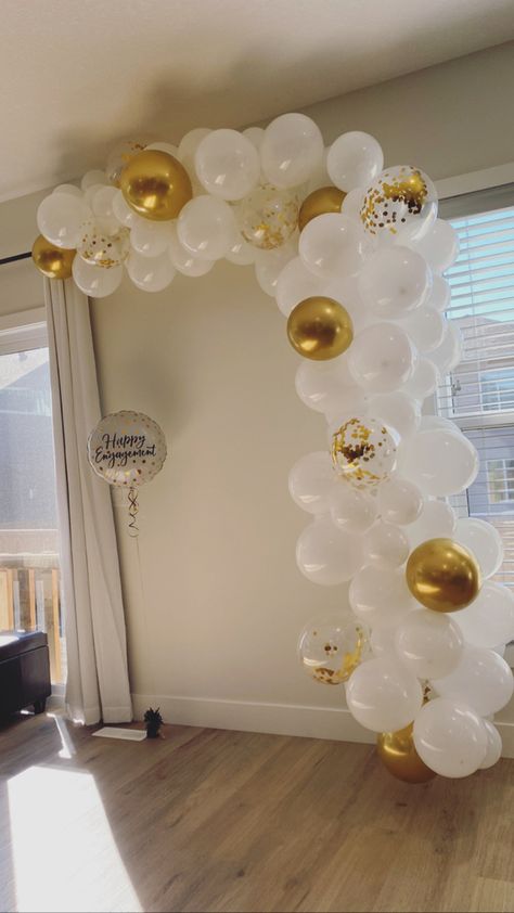 Balloon Arches For Engagement Party, Engagement Party Photo Backdrop Diy, Simple Wedding Balloon Decor, Balloon Engagement Decorations, Simple Decor For Engagement, Balloon Garland Engagement Party, White And Gold Engagement Party Decor, Engagement Party White And Gold, Small Engagement Party Ideas Simple