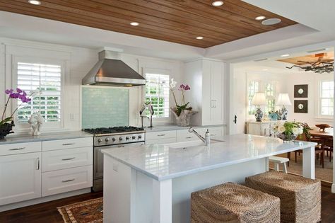 Tropical style kitchen with arctic white quartz counter and aqua glass backsplash Wood Tray Ceiling, Kitchen Lighting Ideas For Low Ceilings, Tropical Kitchen Design, Beach Style Kitchen, Tropical Kitchen, Faucet Kitchen, Kitchen Ceiling, Tray Ceiling, Coastal Kitchen