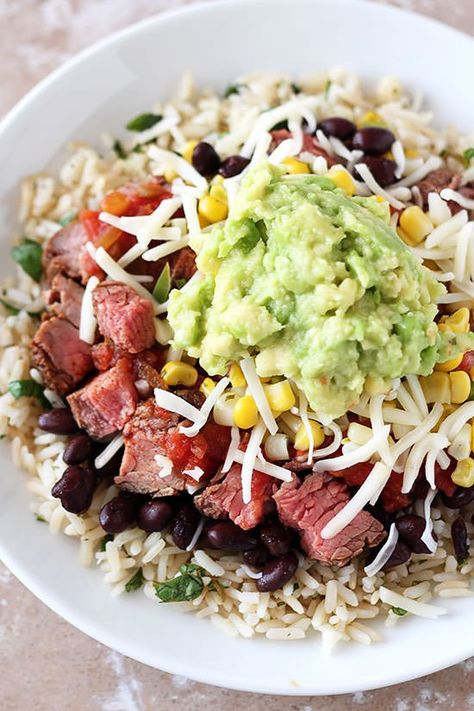 Copycat Steak Burrito Bowl Recipe | Chipotle just got a whole lot tastier. Steak Burrito Bowl Recipe, Steak Burrito Bowl, Simply Filling Recipes, Steak Burrito, Burrito Bowl Recipe, Burrito Bowls Recipe, Burrito Bowls, Dinner Entrees, Burrito Bowl