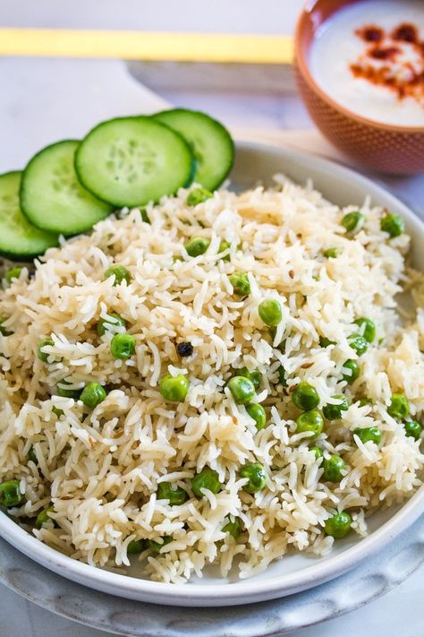 A close up shot of peas pulao made with basmati rice and whole spices. Baked Fudge Recipe, Fudge With Condensed Milk, Cucumber Raita, Pulao Recipe, Rice And Peas, Greek Salad, Basmati Rice, Indian Dishes, Garam Masala