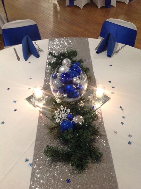 Blue And White Christmas Centerpieces For Table, Blue Christmas Wedding Ideas, Blue Christmas Party Theme, Blue And Silver Christmas Table Decor, Blue And Silver Christmas Centerpieces, Silver And Blue Christmas Decorations, Party Centerpiece Ideas, Holiday Party Centerpieces, Winter Wonderland Centerpieces