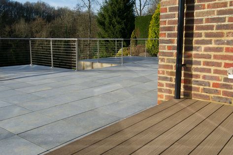 Decking & Porcelain Paving: Perfect Partners Deck Planters, Porcelain Paving, Plastic Decking, Tile Furniture, Paving Slabs, Composite Decking, Wood Deck, Building A Deck, Back Gardens