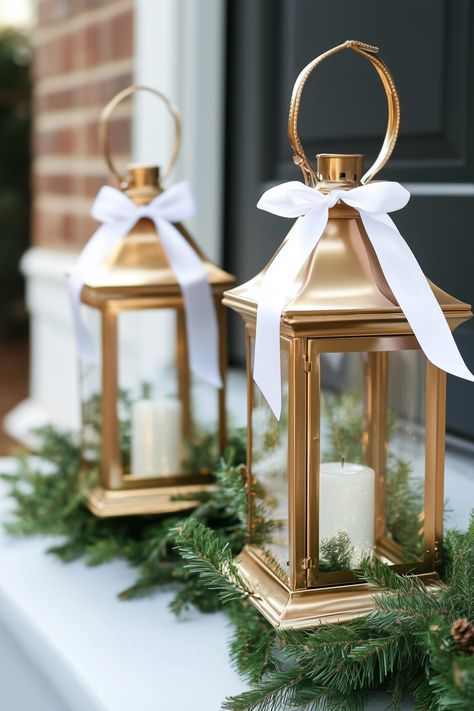 25 Stunning Farmhouse Christmas Porch Decor Ideas Christmas Decor With Lanterns, Winter Lantern Centerpieces, Decorating Lanterns For Christmas, Porch Lanterns Decor, Front Porch Simple, Christmas Lanterns Decorated Diy, Farmhouse Christmas Porch Decor, Christmas Lanterns Decorated, Wood Lantern Decor