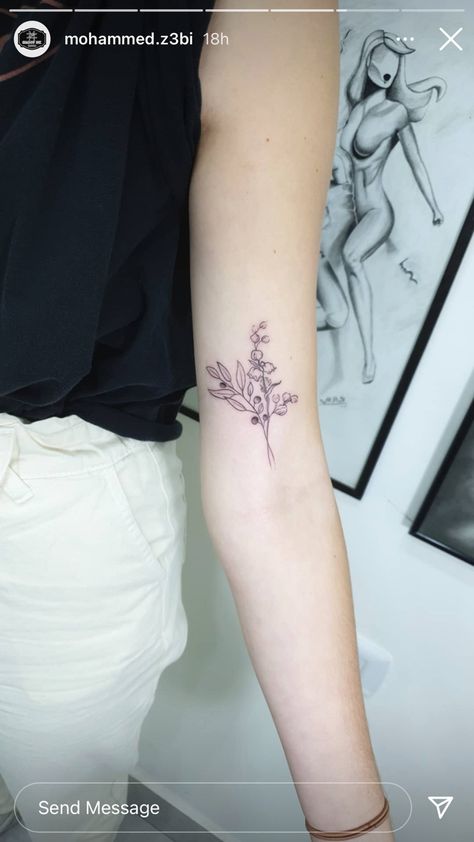 Tattoo done in Amman, Jordan by Shadow Ink Tattoos Lily And Olive Branch Tattoo, Lily Of The Valley Cross Tattoo, Lily Of The Valley Collarbone Tattoo, Biblical Olive Branch Tattoo, Lily Of The Valley Tattoo Back Of Arm, Collarbone Tattoo Olive Branch, Olive Branch Tattoo, Shadow Tattoo, Bible Tattoos