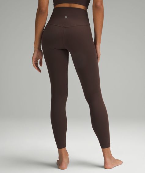 When feeling nothing is everything. The lululemon Align collection, powered by Nulu fabric, is so weightless and buttery soft, all you feel is your practice. Designed for Yoga. Full length intended to sit at ankle. Hidden waistband pocket fits a card or a key, and won't get in your way. This collection's great for low-impact workouts like yoga, or whenever you want to feel really, really comfortable. Lululemon Espresso Set, Brown Lululemon Leggings Outfit, What To Get Mom For Christmas, Brown Lululemon Leggings, Lululemon Favorites, Lulu Lemon Outfits, Lulu Lemon Pants, Brown Lululemon, Cute Athleisure Outfits