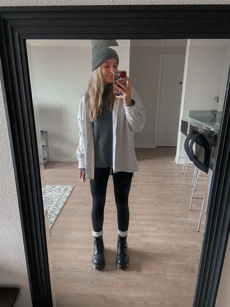 Girl standing in front of mirror wearing zara shirt jacket with a classic pair of leggings, turtleneck sweater, a beanie and platform Doc Martens Leggings And Doc Martens Outfit Winter, Outfits With Leggings And Doc Martens, Dr Martens And Leggings Outfit, Docs Winter Outfit, Dr Marten Leggings Outfit, Black Dock Martins Outfits, Doc Martens Outfit Winter Leggings, Docs And Socks, Legging Doc Martens Outfit