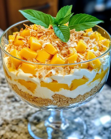 "This Mango Coconut Trifle is a fruity delight that brightens up any day. You'll want to make this again and again!  I’ve been making this Mango Coconut Trifle for years, and every time I serve it, my guests can’t get enough! The layers of creamy coconut and fresh mango are just irresistible.   Ingredients: - 2 ripe mangoes, diced - 1 cup coconut milk - 1 cup whipped cream  For the complete recipe and other ingredients, Link in first comment [👇] [👇]  Give this delicious dessert a try, and you’ll see smiles all around!   #MangoTrifle #CoconutDelight #DessertLovers #EasyDessert #FruitTreat" Coconut Trifle, Mango Trifle, Mango Coconut, Trifle, Coconut Cream, Family Favorites, Easy Desserts, Coconut Milk, 1 Cup