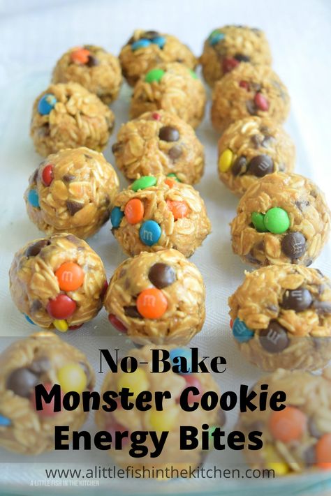 These No-Bake Monster Cookie Energy Bites are easy to make, and they are a reasonably healthy treat to share with friends and family! Use seasonal candy-coated chocolates and these can be a festive addition to any holiday table with joyful pops of color. These are a little bit addictive, so just remember to share! #nobake #nobakedesserts #nobakecookies #energybites #kidfriendly #kidfriendlysnacks #snacks #snacksfortheroad #summerrecipes #afterschoolsnacks #lunchtime #lunchboxrecipes Road Snacks, Bake Sweets, Energy Bites Recipes, Monster Cookie, Peanut Butter Roll, Chocolate Candies, Easy Party Food, Healthy Treat, Lunch Box Recipes