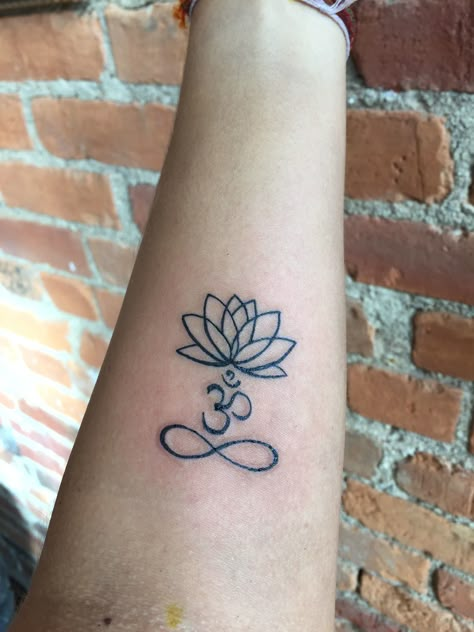 Lotus/ Om/ Infinity tattoo Lotus And Infinity Tattoo, Om With Lotus Tattoo, Infinity Lotus Tattoo, Lotus Infinity Tattoo, Lotus And Om Tattoo, Ohm Lotus Tattoo, Lotus Om Tattoo, Luck Tattoo Ideas, Om Tattoo Meaning