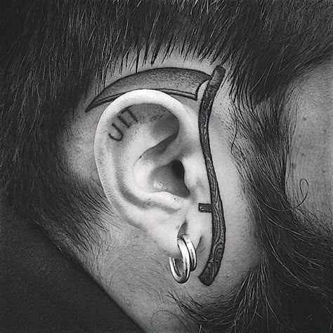 Man With Tattoo Of Scythe Around Ear On Face Mens Face Tattoos, Small Face Tattoos, Face Tats, Unusual Tattoo, Face Tattoos, Home Tattoo, Head Tattoos, Small Tattoo Designs, Face Tattoo