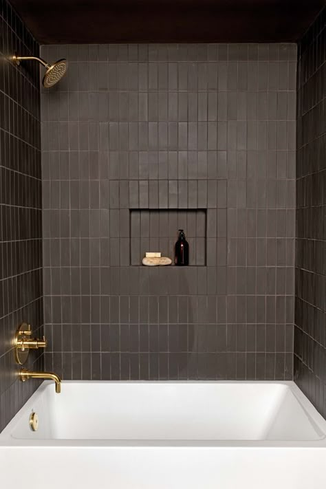 Tile, Bathroom, Room, Wall, Plumbing fixture, Shower, Architecture, Floor, Tap, Flooring, Robert Mckinley, Black Tile Bathrooms, Glam Living Room Decor, Shower Tub Combination, Subway Tiles Bathroom, Glam Living, Glam Living Room, Brown Bathroom, Boys Bathroom