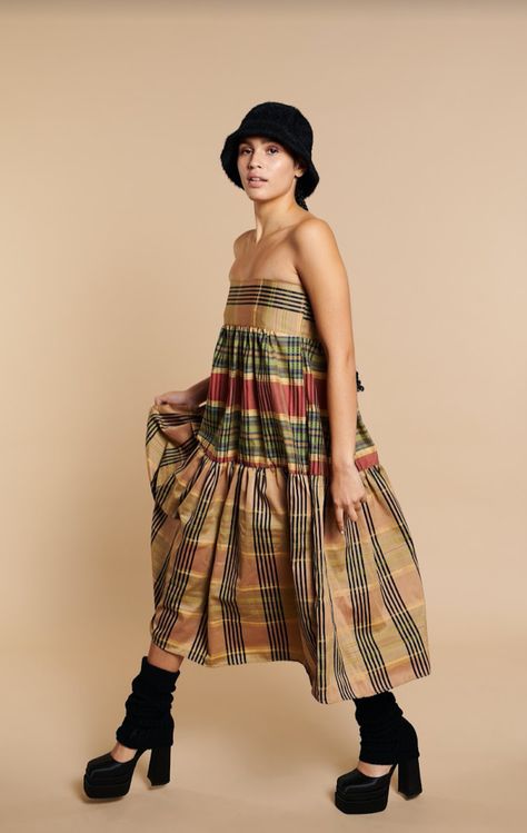 Explore the East Village Tan Plaid Taffeta by Madeline Marrie. This sophisticated piece features a classic tan plaid pattern crafted from luxurious taffeta, offering a timeless and elegant look. Perfect for any occasion, this dress combines refined style with high-quality fabric. Enhance your wardrobe with this chic, plaid taffeta dress today! Eclectic Outfits, Tartan Fashion, Dress Label, Tan Plaid, Slow Fashion Brands, Taffeta Dress, Special Dresses, East Village, Refined Style