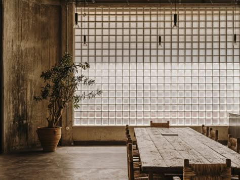 Raw concrete penthouse created inside former Athens warehouse Openhouse Magazine, Andrew Trotter, Brutalist House, Brutalist Interior, Glass Blocks Wall, Moore House, Moody Interiors, Glass Brick, Cosy Living Room