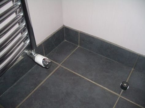 Tiling a floor - under or up to the skirting board? - Page 1 - Homes, Gardens and DIY - PistonHeads Tile Skirting, Tile Baseboard, Floor Skirting, Ensuite Design, How To Tile, Grey Floor, Grey Floor Tiles, Bathroom Ensuite, Bathroom Remodel Tile