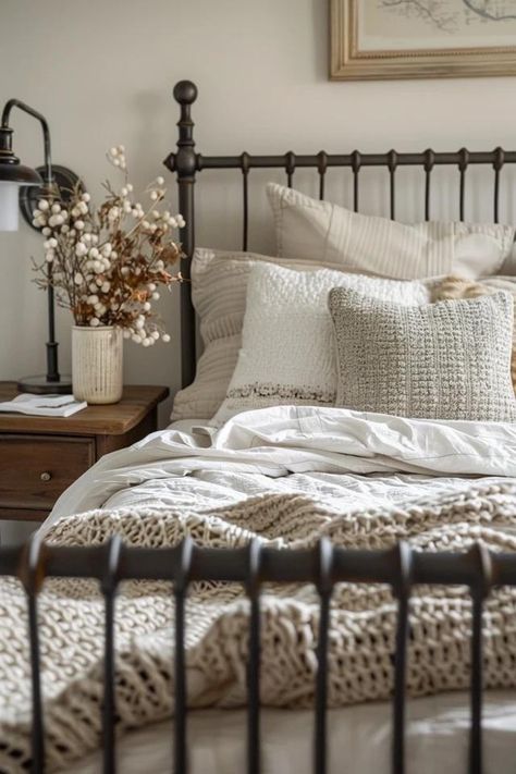 Cozy Farmhouse Bedrooms: Tips &amp; Inspiration Wrought Iron Beds Bedroom, Metal Bedframe Bedroom Ideas Cozy, Iron Bedroom Ideas, Joanna Gaines Farmhouse Bedrooms, Cozy Adult Bedroom, Farmhouse Bedding Ideas, Modern Farmhouse Bedrooms, Magnolia Bedroom, Weathered Wood Furniture