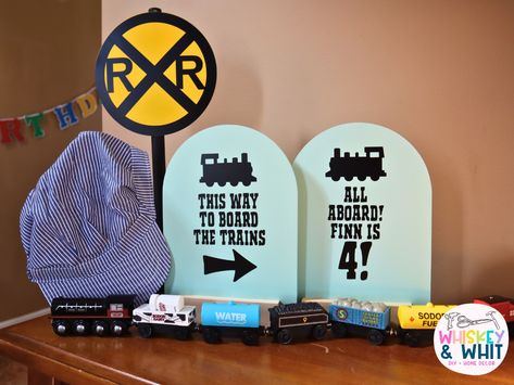 ALL ABOARD! An EPIC DIY Train Birthday Party on a BUDGET! - Whiskey & Whit Dollar Tree Birthday, Cardboard Train, Birthday Party On A Budget, Diy Train, Train Birthday Invitation, Party On A Budget, Train Birthday Party, Polar Express Train, Library Display