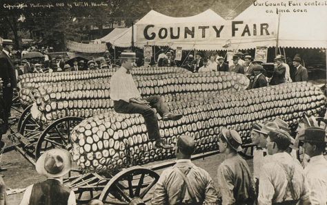 Our County Fair contest on Iowa corn, W. H. Martin, ca. 1910s, Gift of Charles Isaacs and Carol Nigro, Smithsonian American Art Museum. Ears Of Corn, History Of Photography, Man Sitting, County Fair, Antique Postcard, Photo Postcards, Vintage Postcard, Post Cards, Vintage Postcards