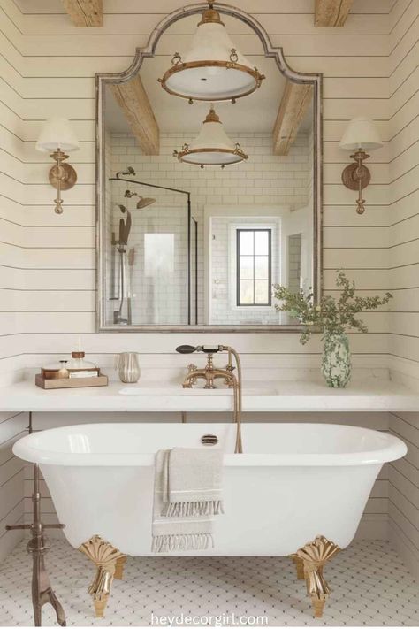 15 Modern French Farmhouse Bathroom Decor Ideas - Hey Decor Girl [Latest Trending Decor Design Ideas] French Farmhouse Bathroom Decor, French Farmhouse Bathroom Ideas, Farmhouse Bathroom Flooring Ideas, French Country Master Bath, French Farmhouse Bathroom, French Country Bathroom Ideas, Modern French Farmhouse, Farmhouse Bathrooms, Farmhouse Bathroom Decor Ideas