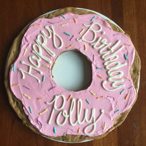 Donut shaped cookie cake with icing sprinkles! Donut Shaped Cake, Donut Cupcake Cake, Donut Cookie Cake, Donut Sheet Cake, Donut Shaped Cookies, Pink Cookie Cake, Happy Half Birthday, Donut Cupcakes, Plain Cookies