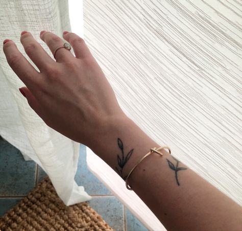 Olive Wrist Tattoo, Olive Branch Tattoo On Wrist, Olive Branch Wrist Wrap Tattoo, Olive Branch Arm Tattoo, Wrist Leaf Tattoo, Leaves Tattoo Wrist, Branch Tattoo Wrist, Olive Branch Wrist Tattoo, Branch Wrist Tattoo