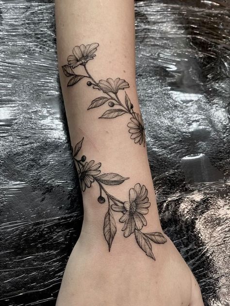 Flower Vine Tattoos Wrist, Add On To Flower Tattoo, Wrist Vines Tattoo, Flowers Around Wrist Tattoo, Wrap Around Forearm Tattoo Women Flowers, Wrap Around Flowers Tattoo, Flower Vine Wrap Tattoo, Flower Vine Tattoos For Women On Arm, Wrist Vine Tattoos For Women