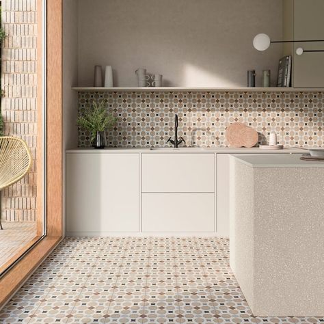 The Portia Pattern tile series unites a handcrafted appearance with geometrics and colour. Its harmonious mix of colours and geometric motifs lend it personality and decorative charm.  Linear brushstrokes of colour on a cement background add a distinctive, colourful, handcrafted touch,  Made in Spain. Suitable for walls and floors with an R10 slip rating.   #floortiles #spanishtiles #tiledwalls #geometrictiles #colourfulinterior #tiledesign #kitchen #interiordesign Tiles Kitchen Floor, Tiles Kitchen, Pattern Tile, Patterned Floor Tiles, Calacatta Marble, Geometric Tiles, Italian Tiles, Tiles Design, Tile Stores