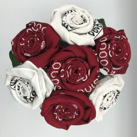 Burgundy and white bandana roses Centerpieces For Quince Burgundy, How To Make A Rose Out Of A Bandana, Quinceanera Lowriders, Bandana Rose How To Make A, How To Make Bandana Roses, Chicana Quinceanera Theme, Low Rider Quinceanera Theme, Bandana Roses Diy, Low Rider Quinceanera