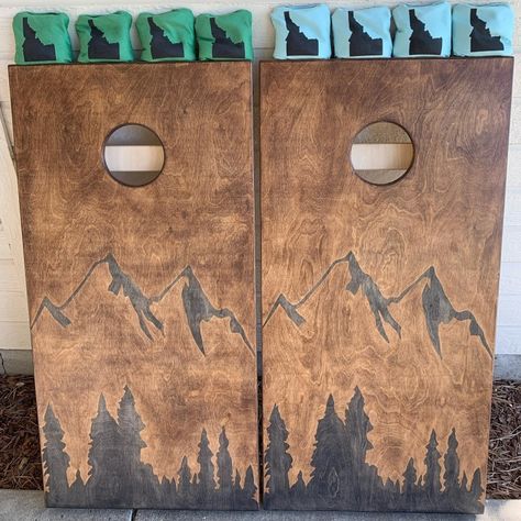 Cornhole Boards Designs Mountains, Mountain Corn Hole Boards, Mountain Cornhole Boards, Cool Cornhole Boards, Cricut Cornhole Boards, Barndo Patio, Corn Hole Boards Designs Ideas, Corn Hole Boards Designs, Cornhole Board Designs