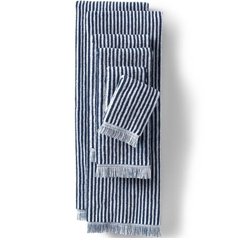 This 100% cotton towel set delivers striped delight alongside a weight substantial enough to keep you wrapped in comfort. The dimension doesn't end with the stripes though. The inch and a quarter fringe border creates an elevated look, too. Striped Towels Bathroom, Striped Delight, Navy Blue Home Decor, College App, Pirate Bathroom, Striped Bathroom, Stripe Towel, Blue Bath Towels, House Upgrades