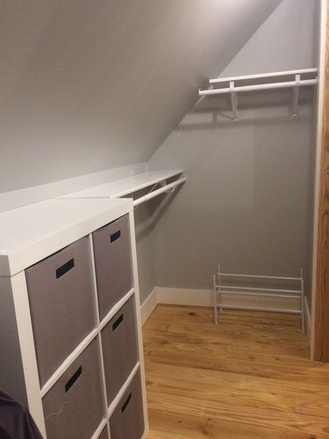 Closet on a budget with sloped ceiling. Small Slanted Closet Organization, Slope Closet Ideas, Closet Organization Slanted Ceiling, Small Sloped Closet, Deep Angled Closet Ideas, Angled Closet Ideas, Knee Wall Closet Slanted Ceiling, Ikea Slanted Ceiling Closet, Closets With Slanted Ceilings