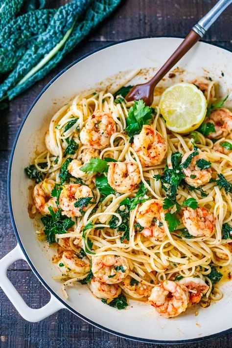 Lemon Garlic Shrimp Pasta | Feasting At Home Garlic Shrimp Pasta Recipes, Pasta With Kale, Lemon Shrimp Pasta, Easy Shrimp Pasta, Shrimp Pasta Recipe, Lemon Garlic Shrimp Pasta, Feasting At Home, Garlic Kale, Lemon Shrimp